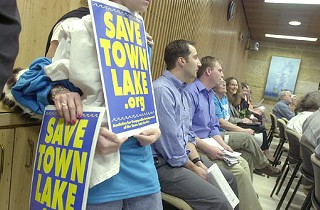 <a href=http://SaveTownLake.org/ target=blank>SaveTownLake.org</a> held a Tuesday evening rally at City Hall, just prior to Planning Commission and Parks & Recreation Board consideration of variances to the Waterfront Overlay. Developers are seeking the variances to build high-rises closer to Town Lake than allowed by code. The group advocates a no-variance policy to the Waterfront Overlay; it presented a petition signed by more than 1,500 like-minded citizens.