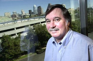 Roger Duncan's Austin Energy office overlooks the solar panels gathering energy on the new Palmer Events Center garage.