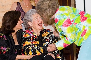 The legendary Lady Bird Johnson, accompanied by daughter Luci, greets Ann Butler at the Lady Bird Johnson Wildflower Center's silver anniversary.