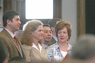 (Front row, l-r) Austin Reps. Eddie Rodriguez, Donna Howard, and Valinda Bolton. Hubert Vo of Houston is standing behind them.

