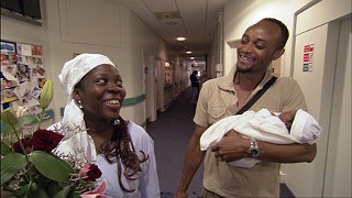In <i>Sicko</i>, filmmaker Michael Moore searches through a British hospital looking for hidden costs for patients. He asks this couple, just exiting with a newborn, What did the baby cost? Nothing, is the cheerful response.