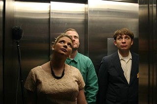 Kitty Kitty Bang Bang dancer Tiffany Love, fiction and 
screenwriter Will Furgeson, and Attack Formation vocalist 
Ben Webster perform a scene in Miles Turner's elevator