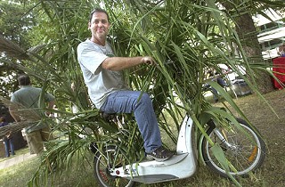 Weirdest commuter winner Tiger Davis, with his bamboo-covered electric scooter, took top billing at a Sept. 28 awards fest sponsored by the Commute Solutions Coalition of Central Texas.