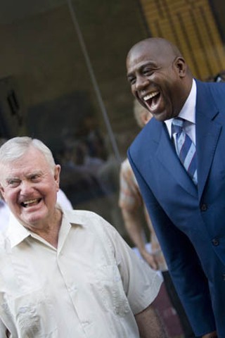 Sports legends Darrell K. Royal (l) and Magic Johnson at the groundbreaking ceremony for the new W Hotel on Second Street