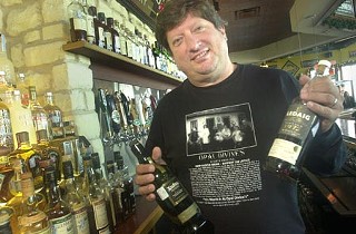 Michael Parker's collection of whiskeys at Opal Divine's