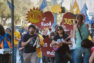 Members and friends of the Florida-based Coalition of Immokalee Workers
protested Saturday, Feb. 9, in front of the Burger King at 2700
Guadalupe the working conditions of field laborers supplying fast-food
giants with one of their essential components: tomatoes. According to a
press release from CIW, whose members are largely Latino immigrants,
“Florida’s farmworkers … face sweatshop conditions every day in the
fields, including: sub-poverty wages (tomato pickers earn roughly
$10,000 a year, according to the Dept. of Labor); no raise in nearly 30
years (at the going rate, workers must pick more than 2.5 tons of
tomatoes just to earn minimum wage for a typical 10-hr day); and the
denial of fundamental labor rights (no right to overtime pay nor right
to organize).” BK wasn’t the group’s only Austin target, however. A CIW
and Fair Food Austin delegation visited Whole Foods HQ Monday to
encourage the organic food behemoth “to take proactive measures to
address sweatshop conditions in its tomato supply chain,” reads another
CIW press release. <i>Cheryl Smith</i>