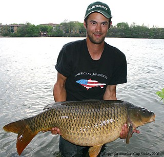 Al St. Cyr and the state-record setting carp he caught in then-Town Lake