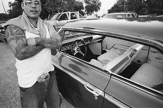 A collection of photos by John Langmore, “Fault Line: A Portrait of East Austin,” currently on exhibit at the Mexican American Cultural Center, kicked off passionate discussions about artistic voice and gentrification at the recent Congress for the New Urbanism and at the exhibition’s opening, April 10. The one-year project celebrates “the beauty, the history, the charm, and the perseverance of the people of East Austin.” See the compelling large-scale images through Sunday, April 27, at the MACC Community Hall Gallery, 600 River St. From the artist’s statement: “That the gentrification disrupting so many working-class neighborhoods across the country will work its hand on East Austin is a certainty. While change is inevitable, that does nothing to alter the fact that it is also most often lamentable. Lost will be an important history, a strong and deep-rooted sense of community, and a patina that exists nowhere else in a city vying for its spot on the lists of America’s ‘coolest’ places to live.” – <i>Katherine Gregor</i>