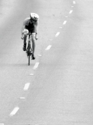 Daniel Vertiz bikes the lonely road.