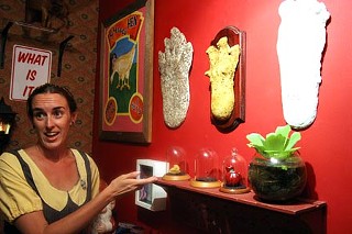 Jen Hirt proudly displaying the largest collection of yeti toys in North America