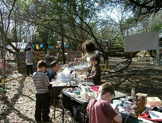 Children get some hands-on experience at a recycled-material workshop hosted by Greater Austin Garbage Arts and presented at the Enchanted Forest's annual Art Outside event.