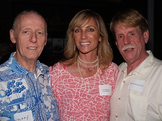 Dave Sullivan (r), our new executive director of First Night Austin, with his partner, David Johnson (l), and the glamorous publicist Patricia Paredes, among the guests at the Mueller Law Office/Voodoo Cowboy party