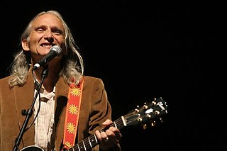 Jimmie Dale Gilmore entertains a crowd of Democrats gathered at the Long Center Tuesday to watch the Obama-McCain debate.