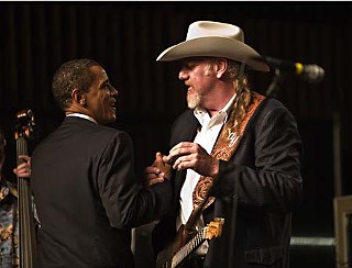Big Wheel keeps on turnin': President-elect Barack Obama (l) and Ray Benson at the Austin Music Hall, Feb. 21