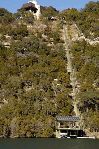 An increase in private trams such as this one on Lake Austin has sparked concerns about shoreline erosion and a lack of city oversight.