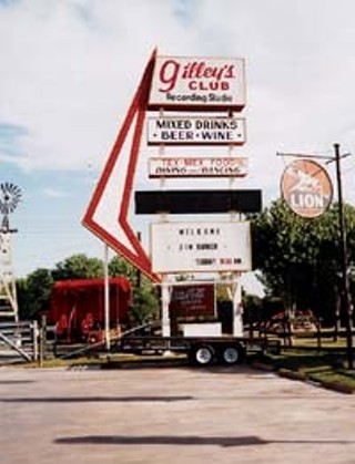 The sign that pointed a million pickups into the unpaved  parking area is now a few miles down Spencer at the  Cowboy Ranch restaurant.