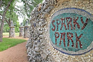 Sparky Park, near the corner of Grooms and 38th streets, features a grotto wall created by local artist Berthold Haas. 
Why Sparky? Electrical sparks sometimes flew from the Austin Energy substation formerly on the site.