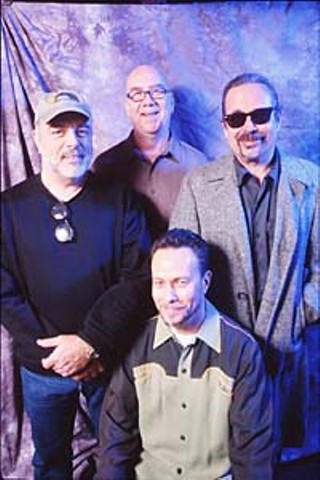 Blue Monday Band, 2000 (l-r): Riley Osborn, George Rains, Roscoe Beck, and Derek O'Brien