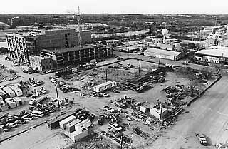 Southwest view of Town Lake between San Antonio and Guadalupe: First of three projected CSC buildings is at upper left, facing Palmer Auditorium