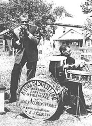 Sonny Boy Williamson and Peck Curtis live on the air.