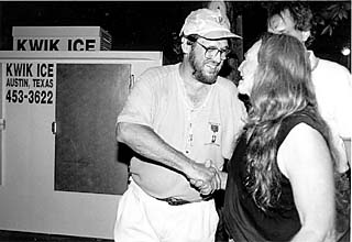 O'Connor (l) with Willie Nelson at the opening of the Backyard, April 15, 1993