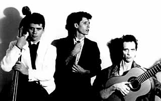 Publicity photo of Los Mortales, Houston, ca. 1993: Jim Wallace, Robert Conran, Steve Baker
