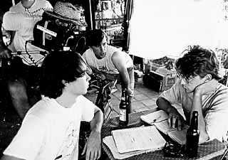 Richard Linklater (c) directs a scene at Les Amis.<br>
(Courtesy of the Austin Film Society)
