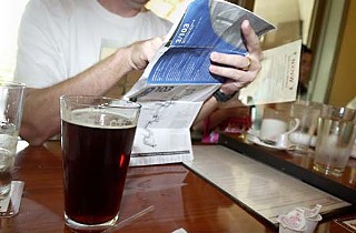 Breakfast beer at NXNW: The author checks the bus schedule.