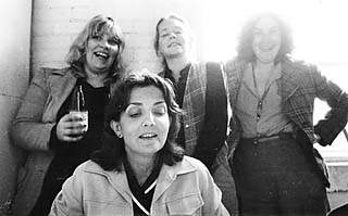 Up in the hated 16th Street loft (l-r): Margaret Moser, Carolyn Phillips, Susan Grady, and Kathleen Maher. It must be winter, we're wearing clothes.