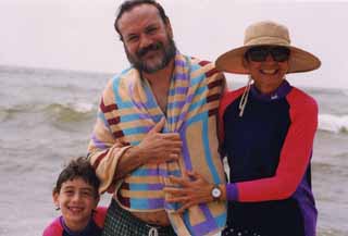 She married a slacker. Anne Lewis and Louis Black with son Eli.