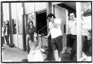 Mike Hall, Carolyn Phillips, Leeann Atherton, Nick Barbaro, and Jerald Corder make the best of it while Barbaro conducts business as usual.
