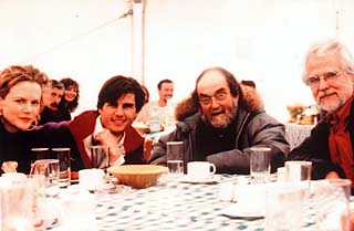 Nicole Kidman, Tom Cruise, Stanley Kubrick, and Jan Harlan on the set of <i>Eyes Wide Shut</i>.