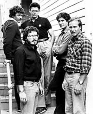 Writer/director Lawrence Kasdan (center) directs the men of 1983's <i>The Big Chill</i>: Tom Berenger, Jeff Goldblum, Kevin Kline, and William Hurt.