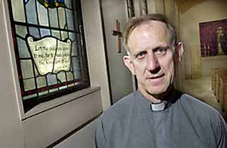 The Rev. John Payne, S.J., St. Michael's director of faith and community formation, says his job is to help the school clarify its Catholic identity.