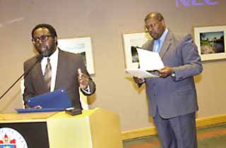 Council Member Danny Thomas presented 14 Austinites with Distinguished Service Awards from the mayor and City Council last Thursday. Among the more notable awardees were KAZI radio host Rev. Frank Garrett, Eastside Social Action Coalition leader Dr. Sterling Lands, and former City Council Member Eric Mitchell. Above, Nelson Linder (at podium), head of the local NAACP, accepts an award from Thomas.