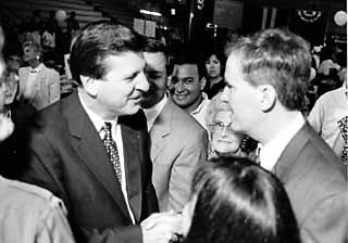 Strange bedfellows: In 1994, then-Mayor Bruce Todd (l) and then-<i>Austin Chronicle</i> journalist Daryl Slusher (right) were smiling at each other through gritted teeth after Todd held off Slusher's challenge in a bitter election. At one point in the race, Todd called Slusher a jackass, and Slusher was less polite than that. This week they were on the same side in court -- now-lobbyist Todd had helped now-City Council Member Slusher collect signatures to run again, and Slusher opponent Kirk Mitchell challenged the signatures in court. On Tuesday, the case was thrown out.