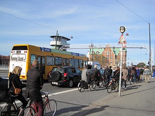 Copenhagen's multimodal mix: Transit, cars, cyclists, and pedestrians each get a lane.