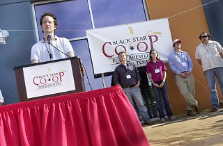 Black Star Co-op board member Mark Wochner speaks at an opening event on Nov. 14.