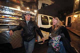The food truck is here: Kevin Dunn greets a familiar face on a Mobile Loaves run.