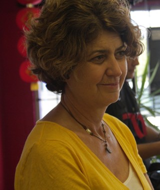Filmmaker Nancy Schiesari on location at River City Tattoo in Killeen, Texas