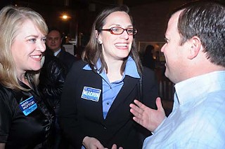 Amy Clark Meachum (center)