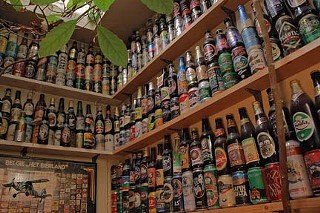 Shelton's collection of beer bottles.