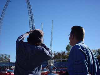 Filmmaker Robert Rodriguez and Reel FX founder Dale Carmen discuss a shot on location at Six Flags in Arlington.