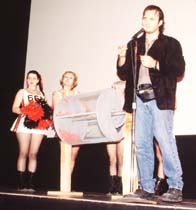 Rodriguez speaks onstage next to the barrel from which the GTO winner will be drawn