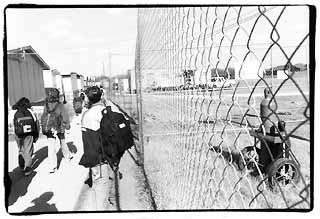 Students walking outside their school.