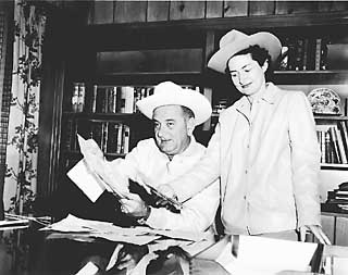 Senator and Mrs. Johnson receive congratulations on November 16, 1959, their 35th wedding anniversary AS-59-25171-1, Austin Hhistory Center, Austin Public Libarary